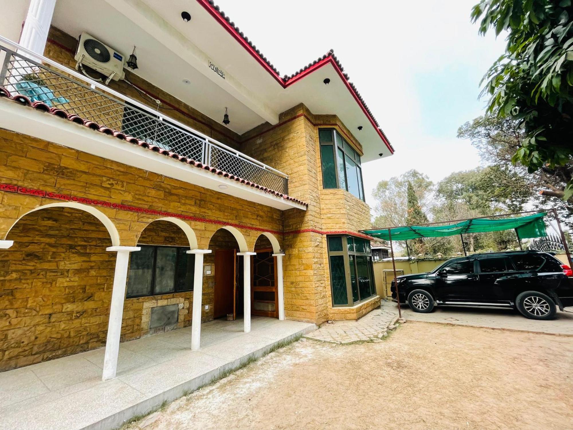 Hilton Guest House Islamabad Buitenkant foto